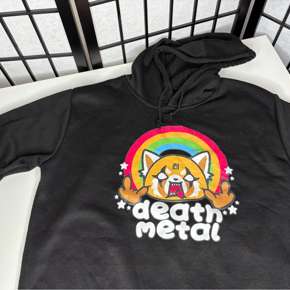 Sanrio Black Hoodie with Colorful Graphic